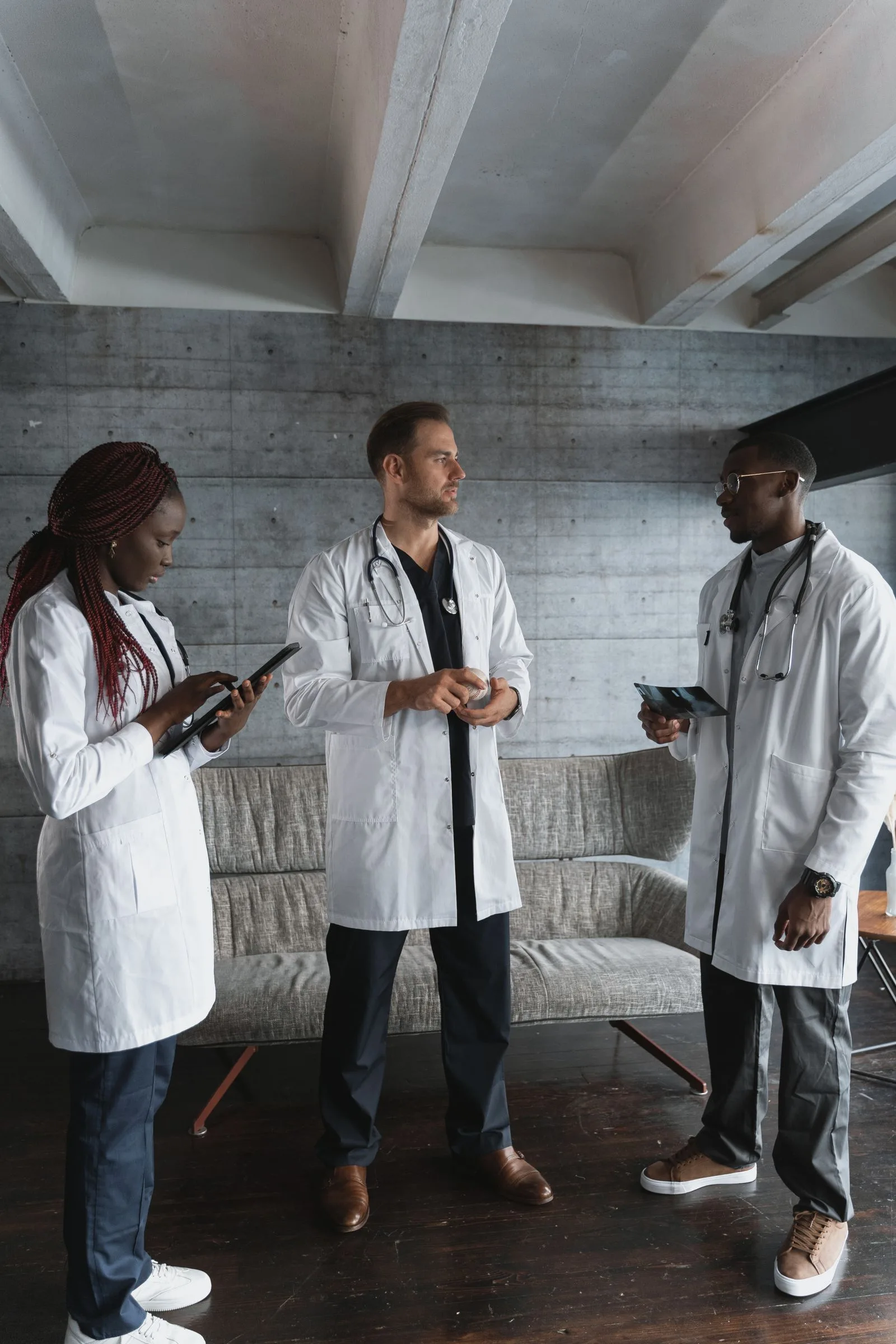 Healthcare professionals discussing a patient workflow